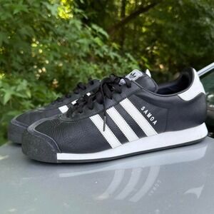 Black and white Adidas Samoa trainers